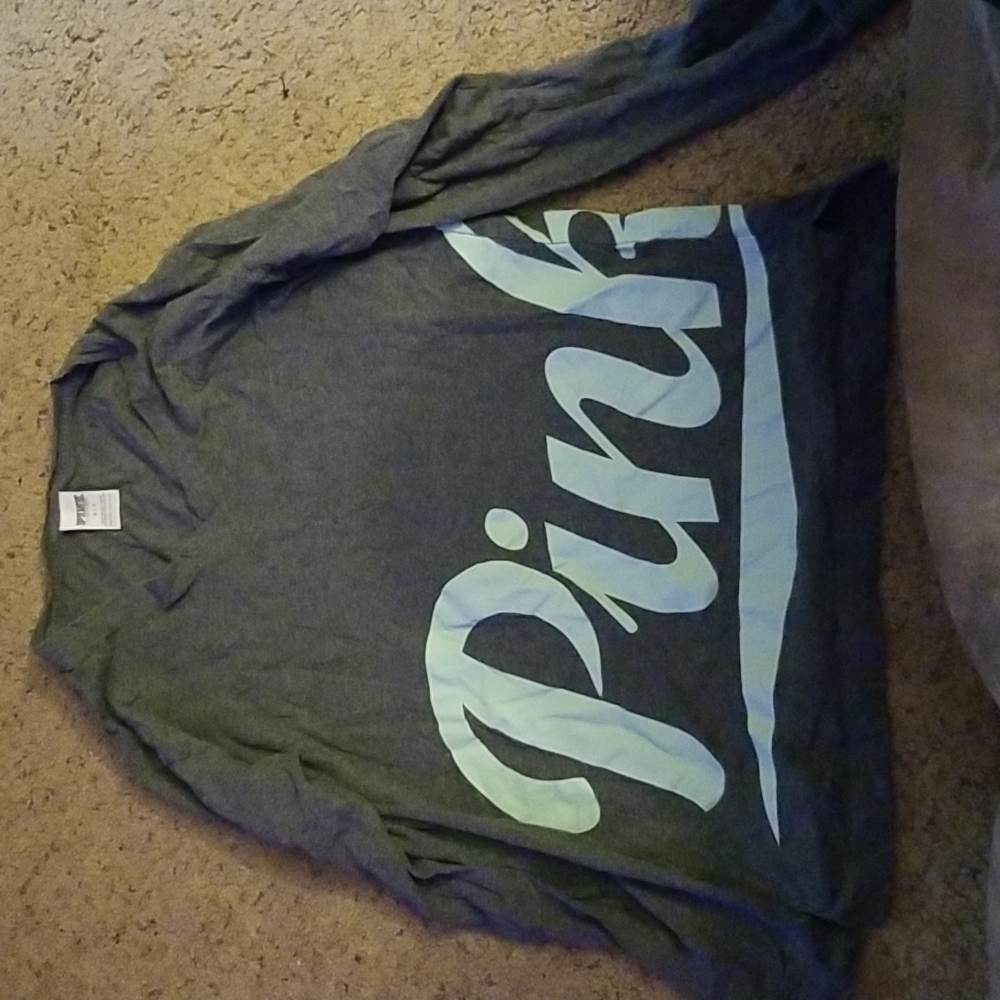 Small pink branded shirt